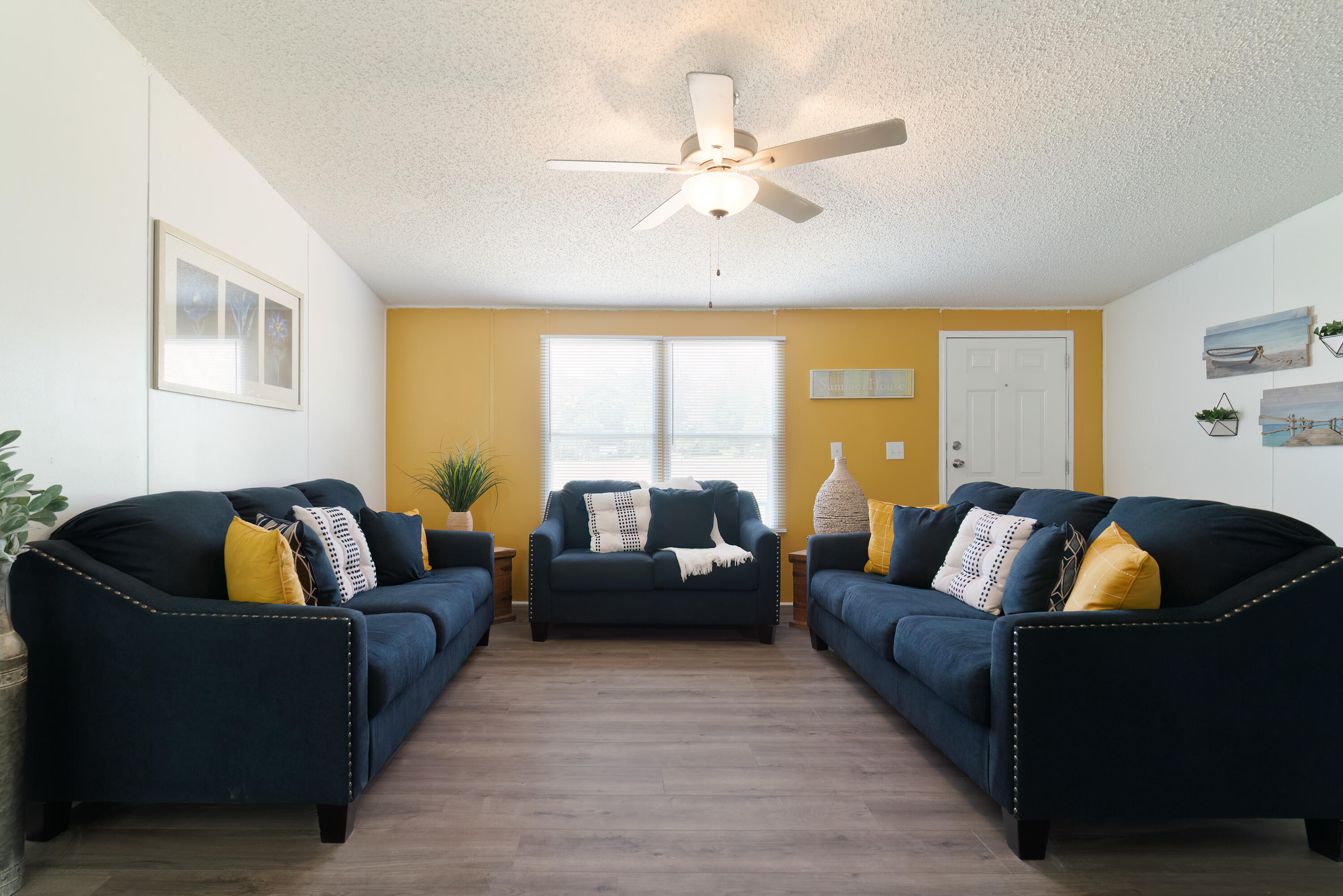 1032 Whitehead Drive Holt, FL 32564 - Photo 2 of 40 a living room with furniture and a large window