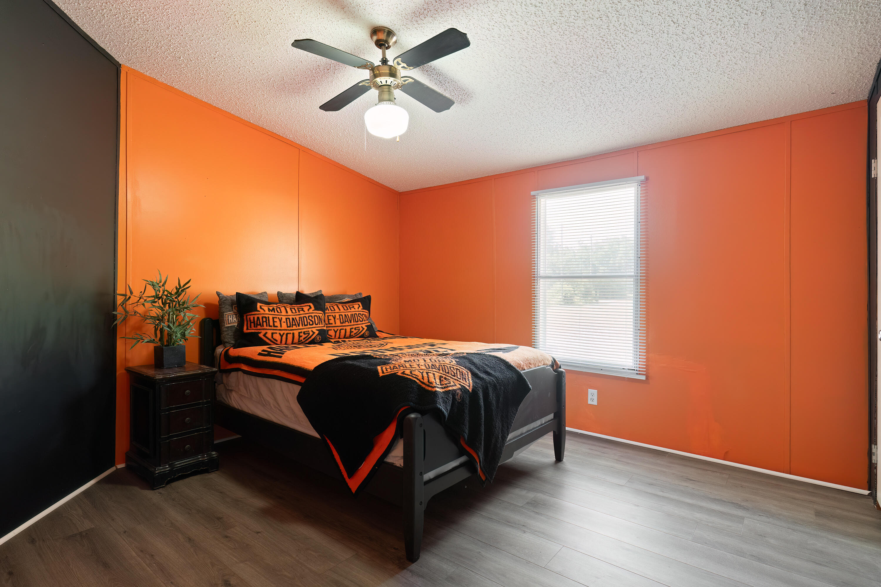 1032 Whitehead Drive Holt, FL 32564 - Photo 25 of 40 a bed room with a bed and a ceiling fan