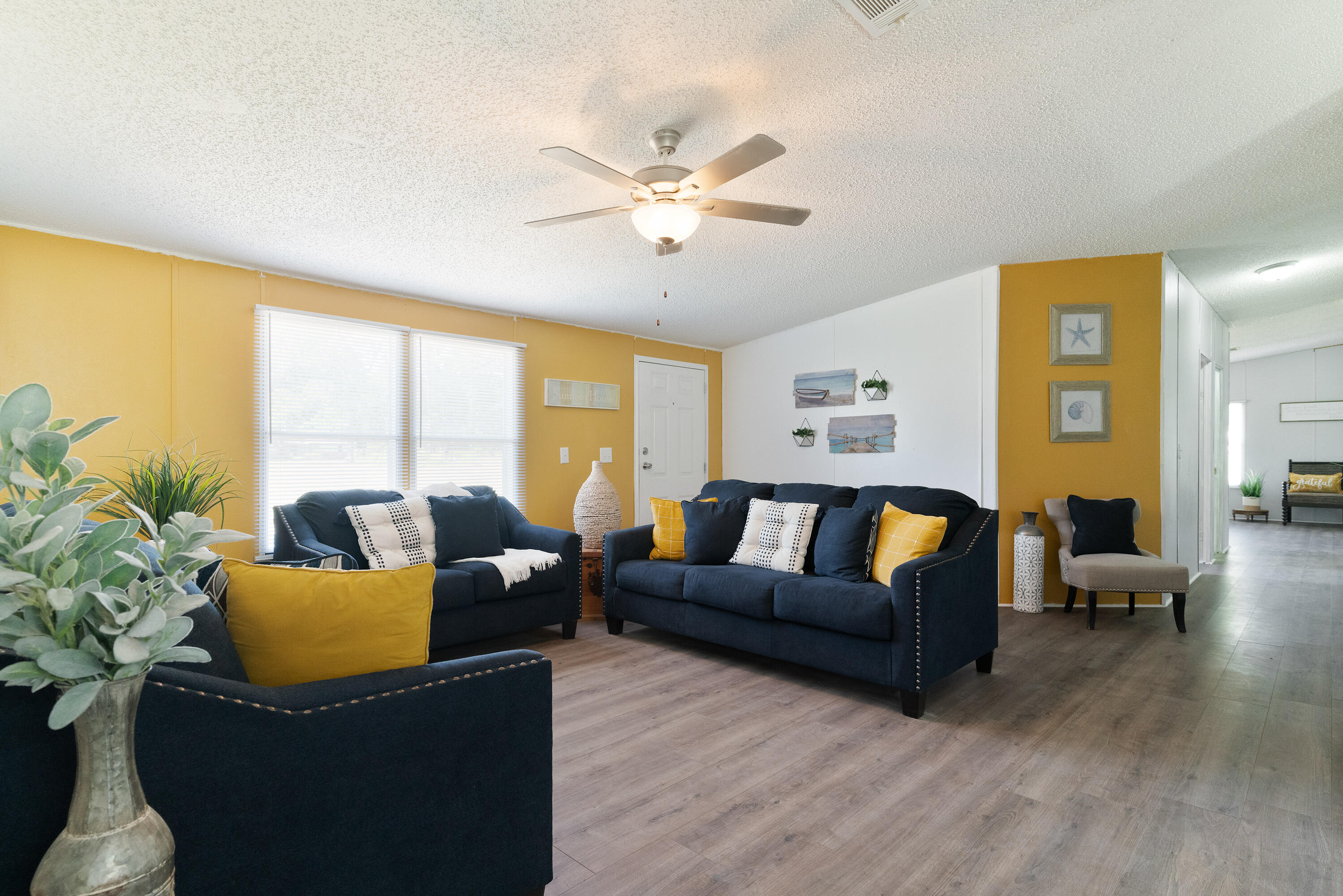 1032 Whitehead Drive Holt, FL 32564 - Photo 3 of 40 a living room with furniture and a large window