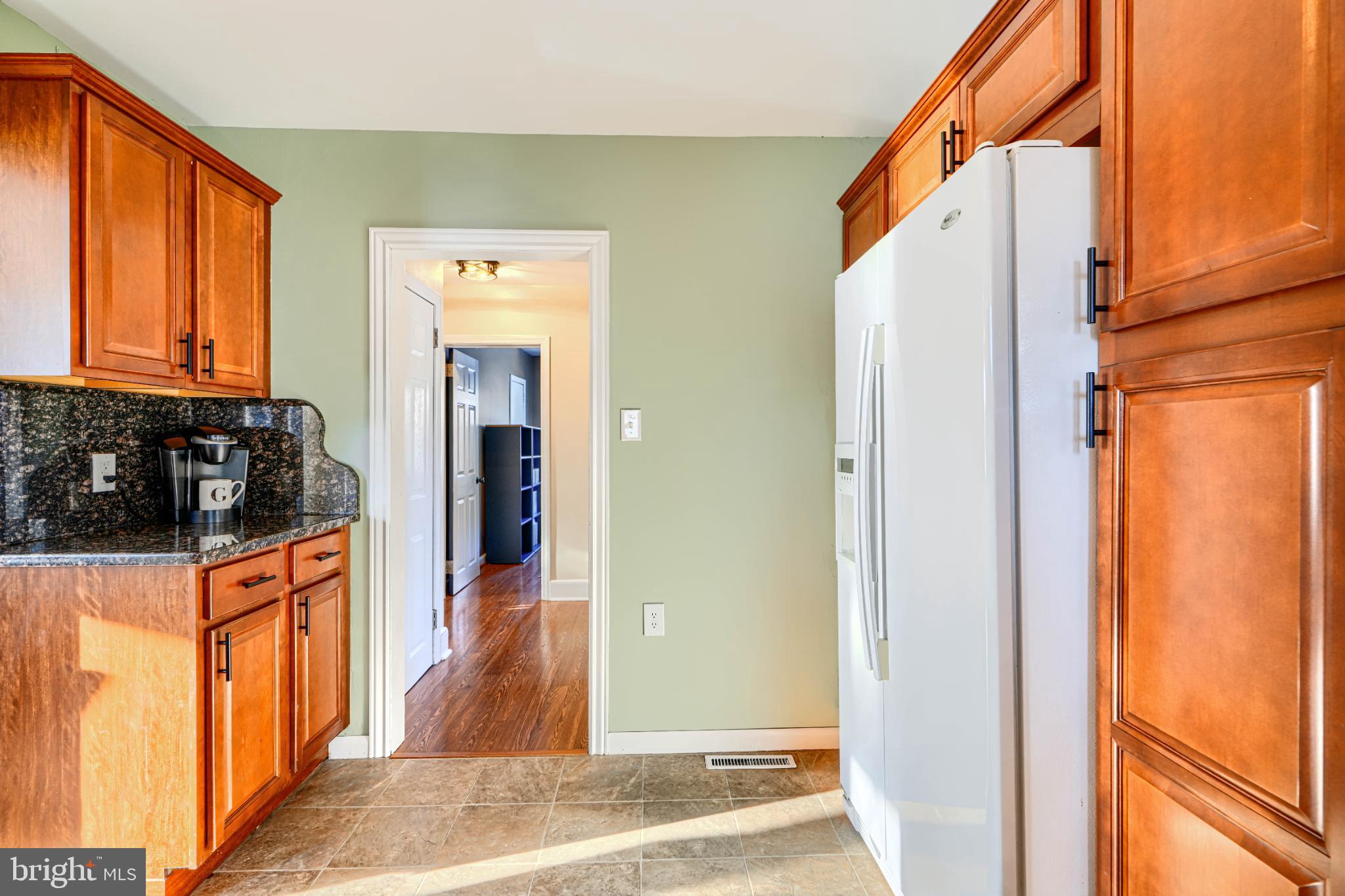 5706 Allender Road White Marsh, MD 21162 - Photo 18 of 61 Modern kitchen with warm wood accents.