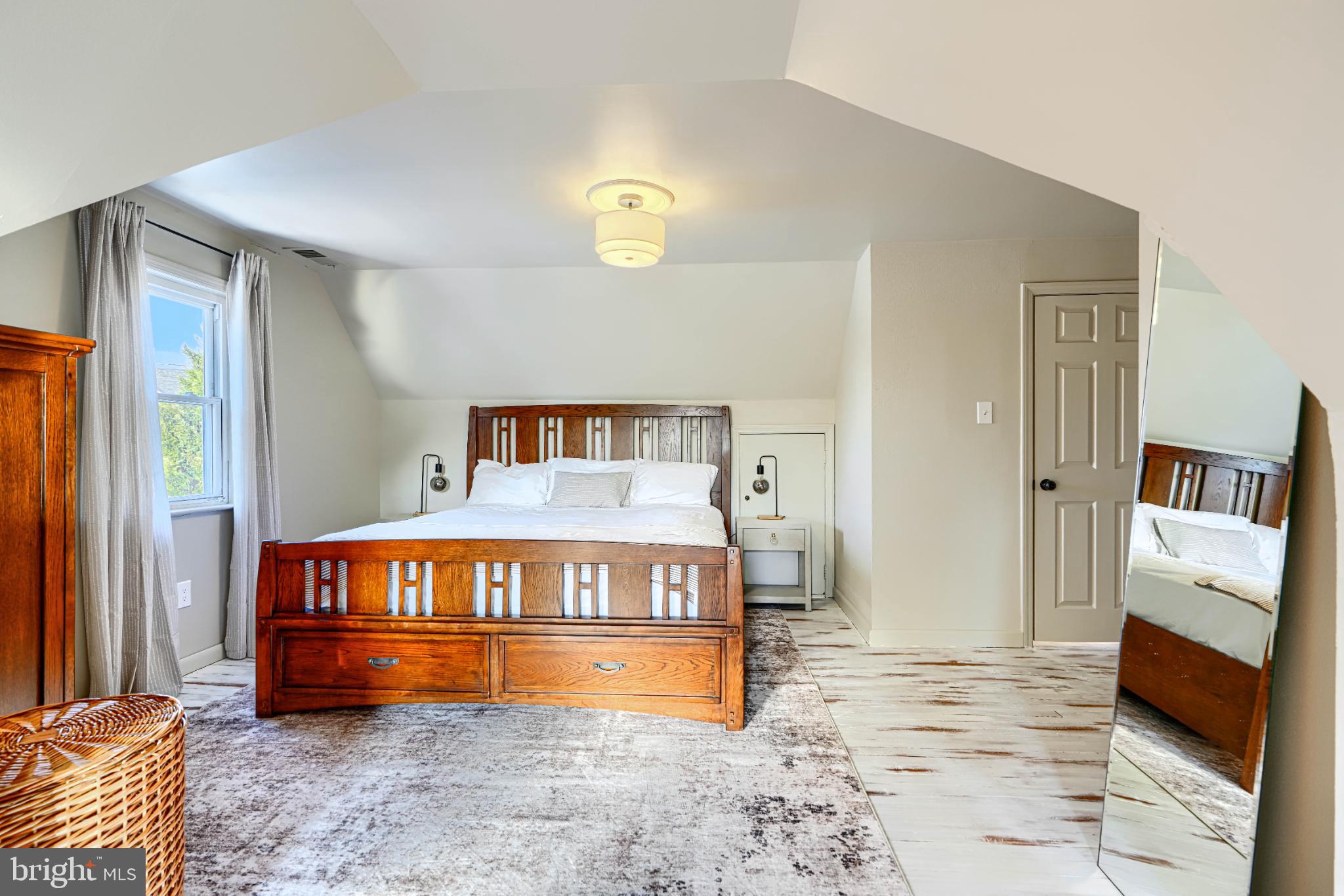 5706 Allender Road White Marsh, MD 21162 - Photo 28 of 61 a bedroom with bed and a window