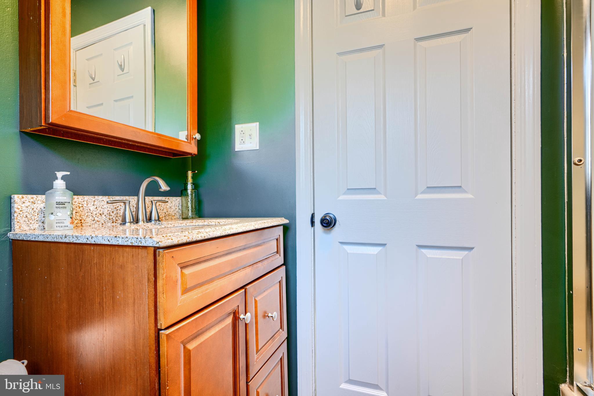 5706 Allender Road White Marsh, MD 21162 - Photo 39 of 61 a utility room with a sink a washer and dryer