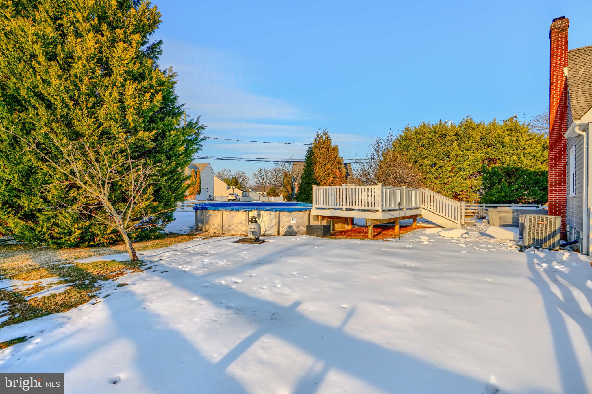 5706 Allender Road White Marsh, MD 21162 - Photo 44 of 61 Sunny winter retreat with a serene backdrop.