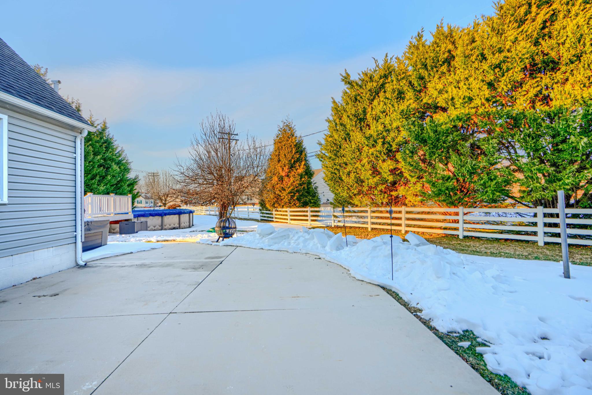 5706 Allender Road White Marsh, MD 21162 - Photo 45 of 61 a view of a swimming pool with an outdoor seating
