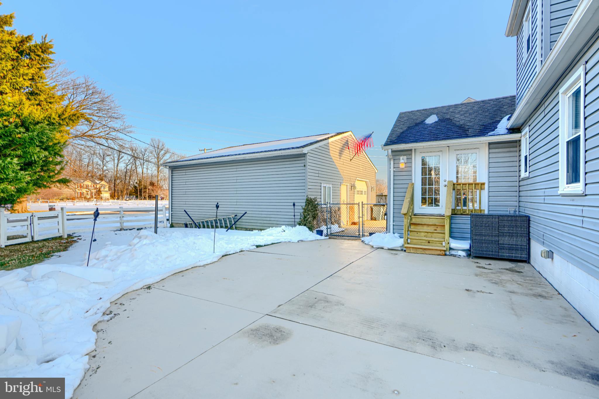 5706 Allender Road White Marsh, MD 21162 - Photo 52 of 61 a view of a house with backyard and a tree