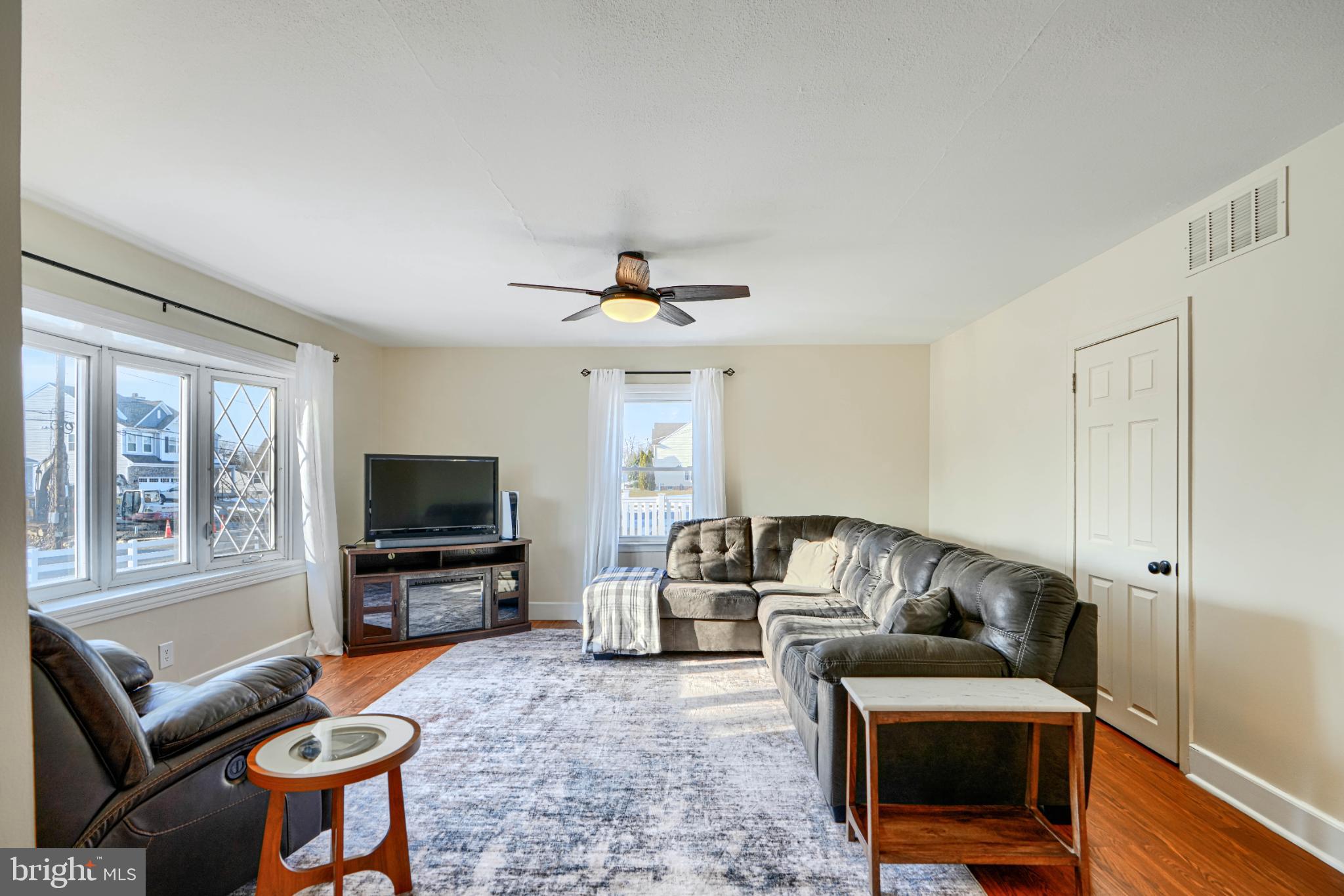 5706 Allender Road White Marsh, MD 21162 - Photo 6 of 61 a living room with furniture and a flat screen tv