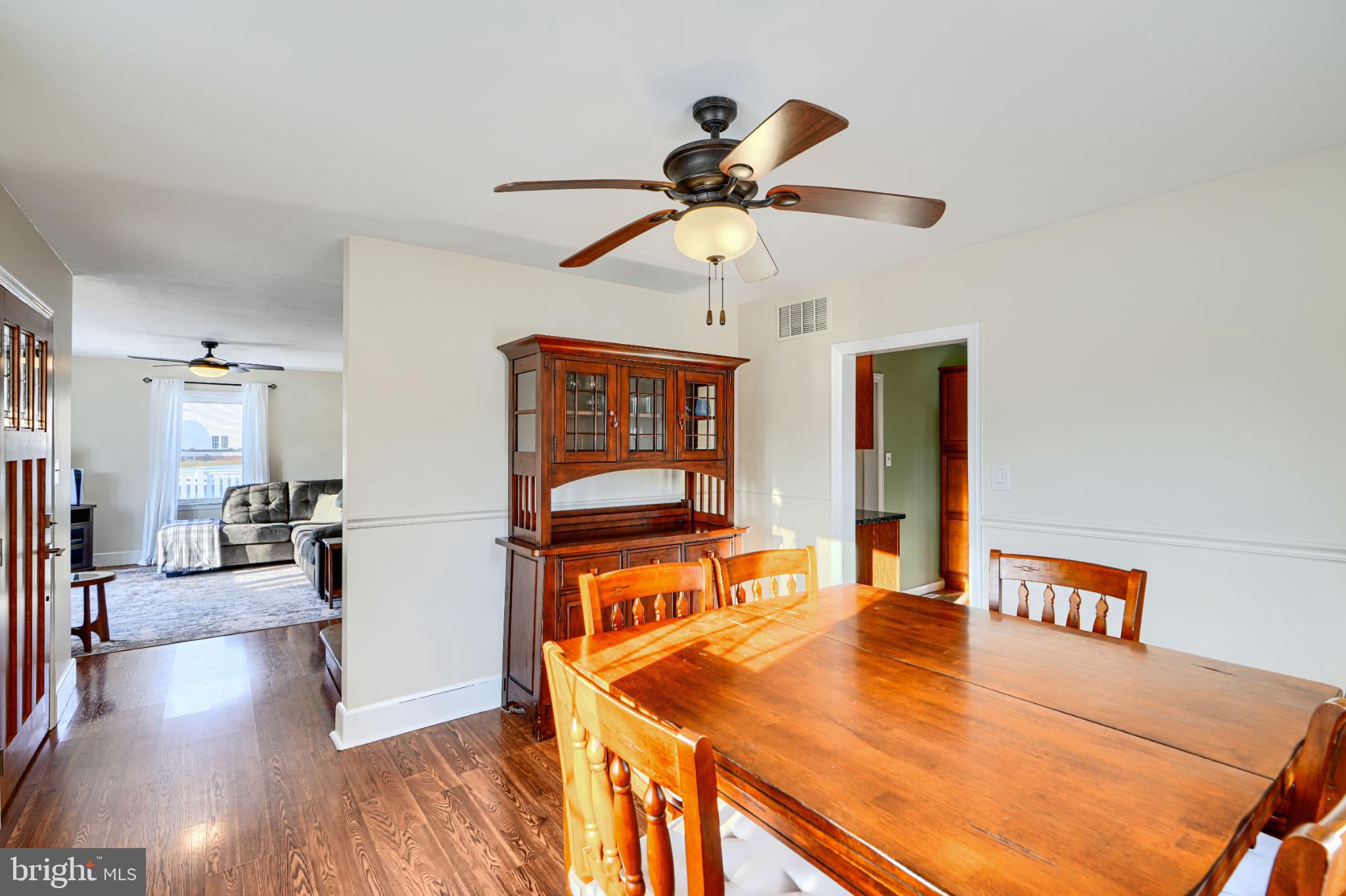 5706 Allender Road White Marsh, MD 21162 - Photo 9 of 61 a view of a dining room with furniture and wooden floor