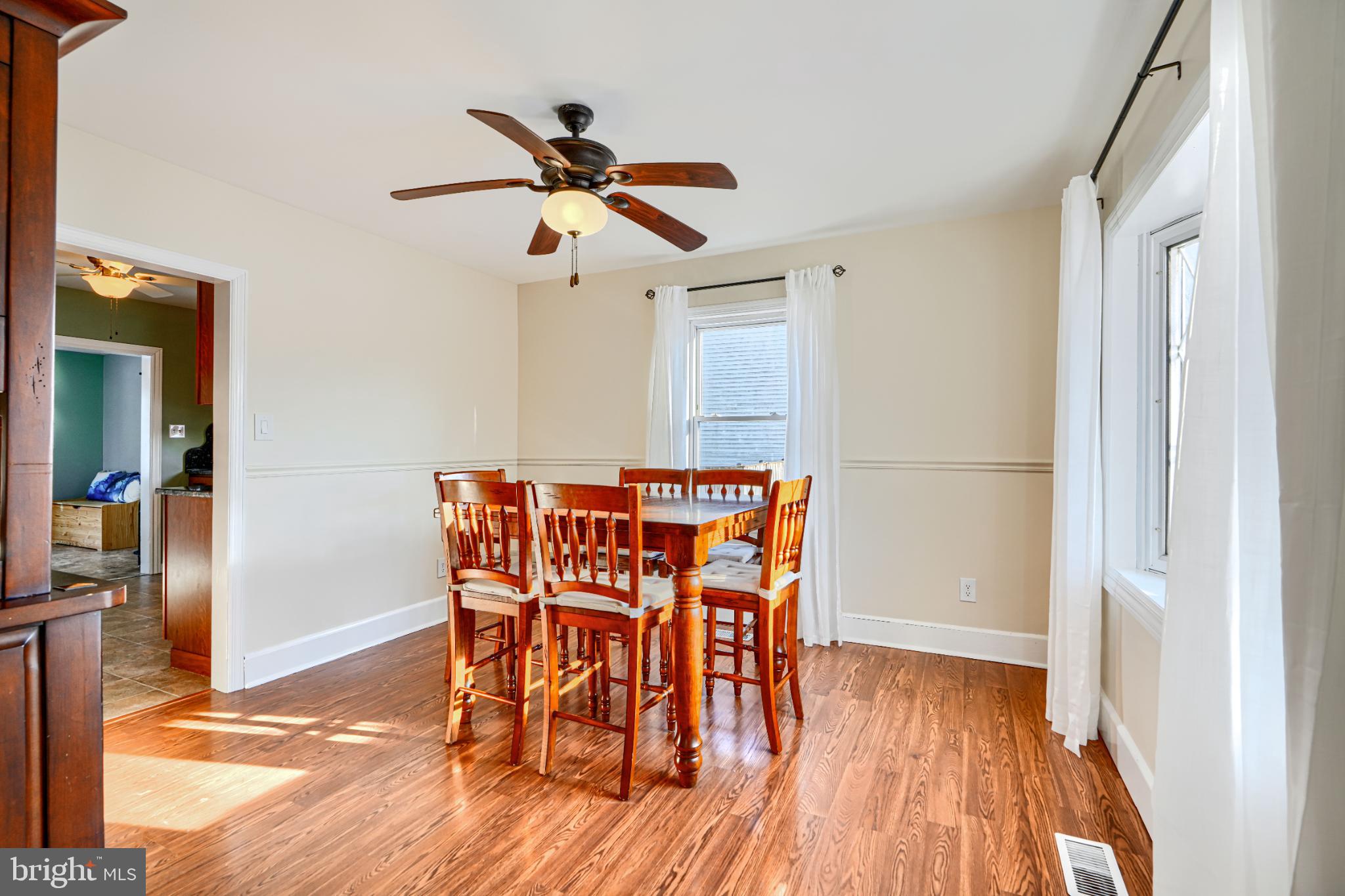 5706 Allender Road White Marsh, MD 21162 - Photo 10 of 61 a dining room with furniture and wooden floor