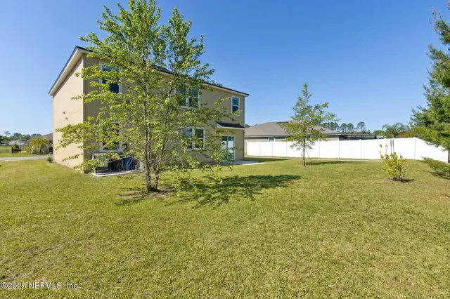 a view of a golf course with a park
