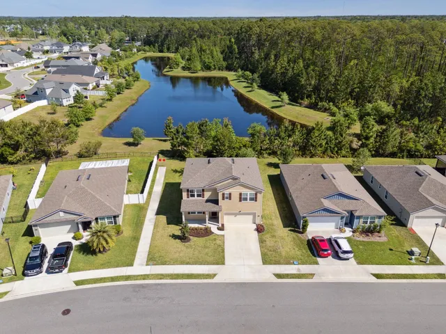 a view of a lake with a big yard