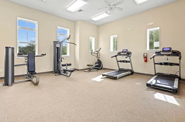 a view of a house with backyard