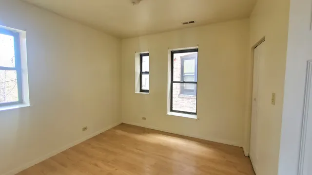 an empty room with windows