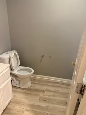 a bathroom with a toilet and a sink
