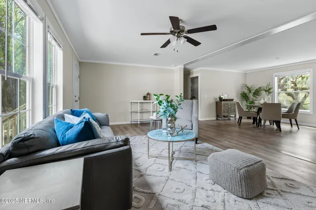 a kitchen with a table and chairs in it