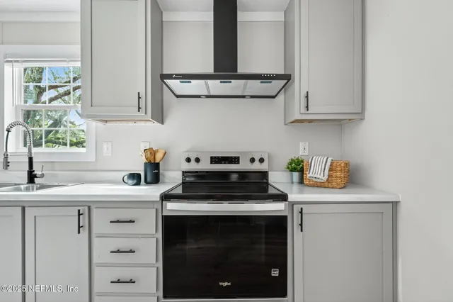 a view of a dining room with furniture and window