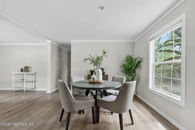 a bathroom with a double vanity sink toilet and shower