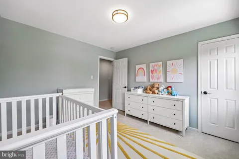 a view of livingroom with furniture and stairs