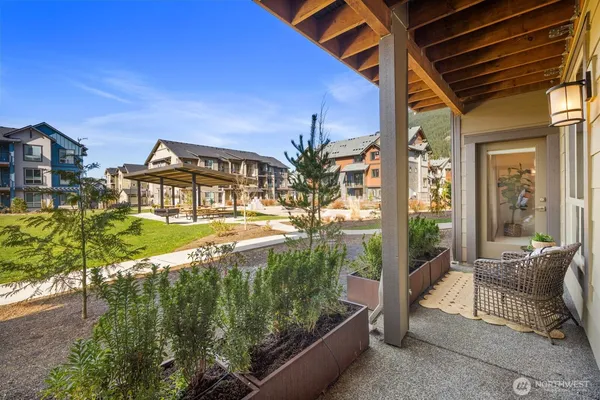 a view of swimming pool with outdoor seating and a yard