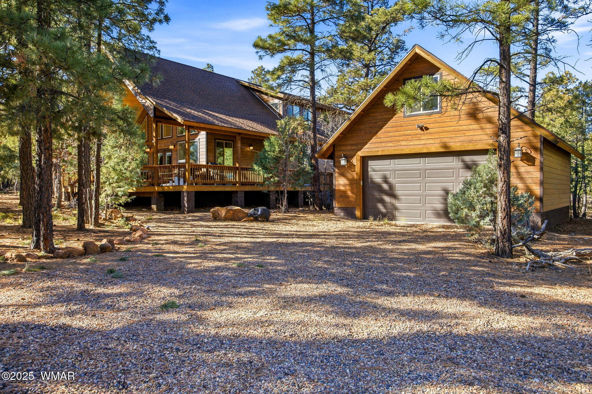 2009 Judy Ranch Road Overgaard, AZ 85933 - Photo 1 of 32 a front view of a house with a yard