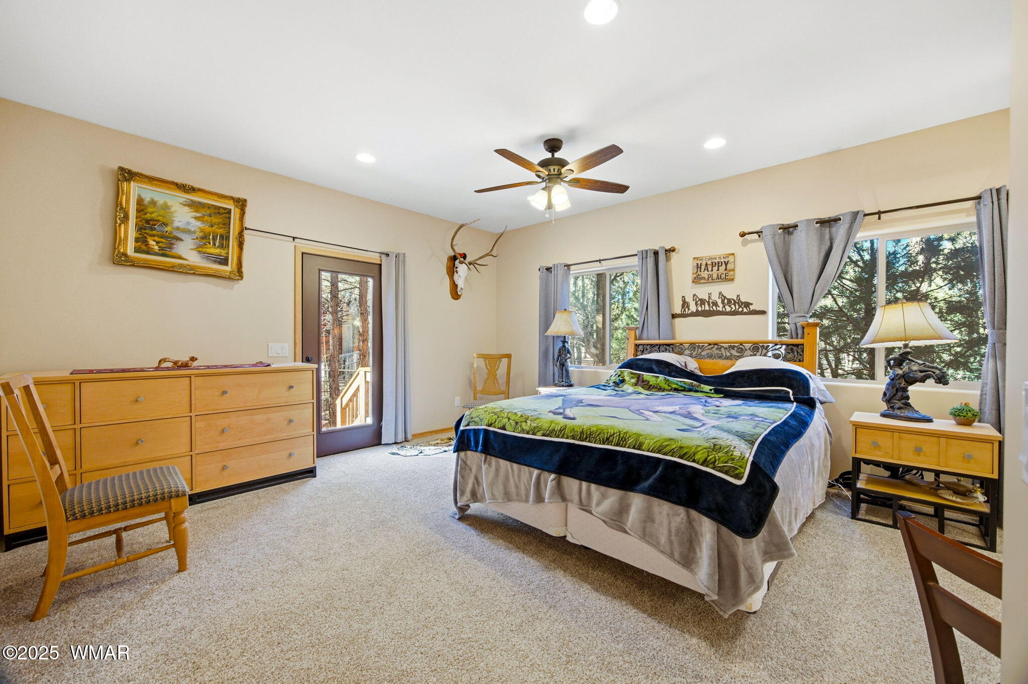 2009 Judy Ranch Road Overgaard, AZ 85933 - Photo 13 of 32 a bedroom with a bed dresser and a window