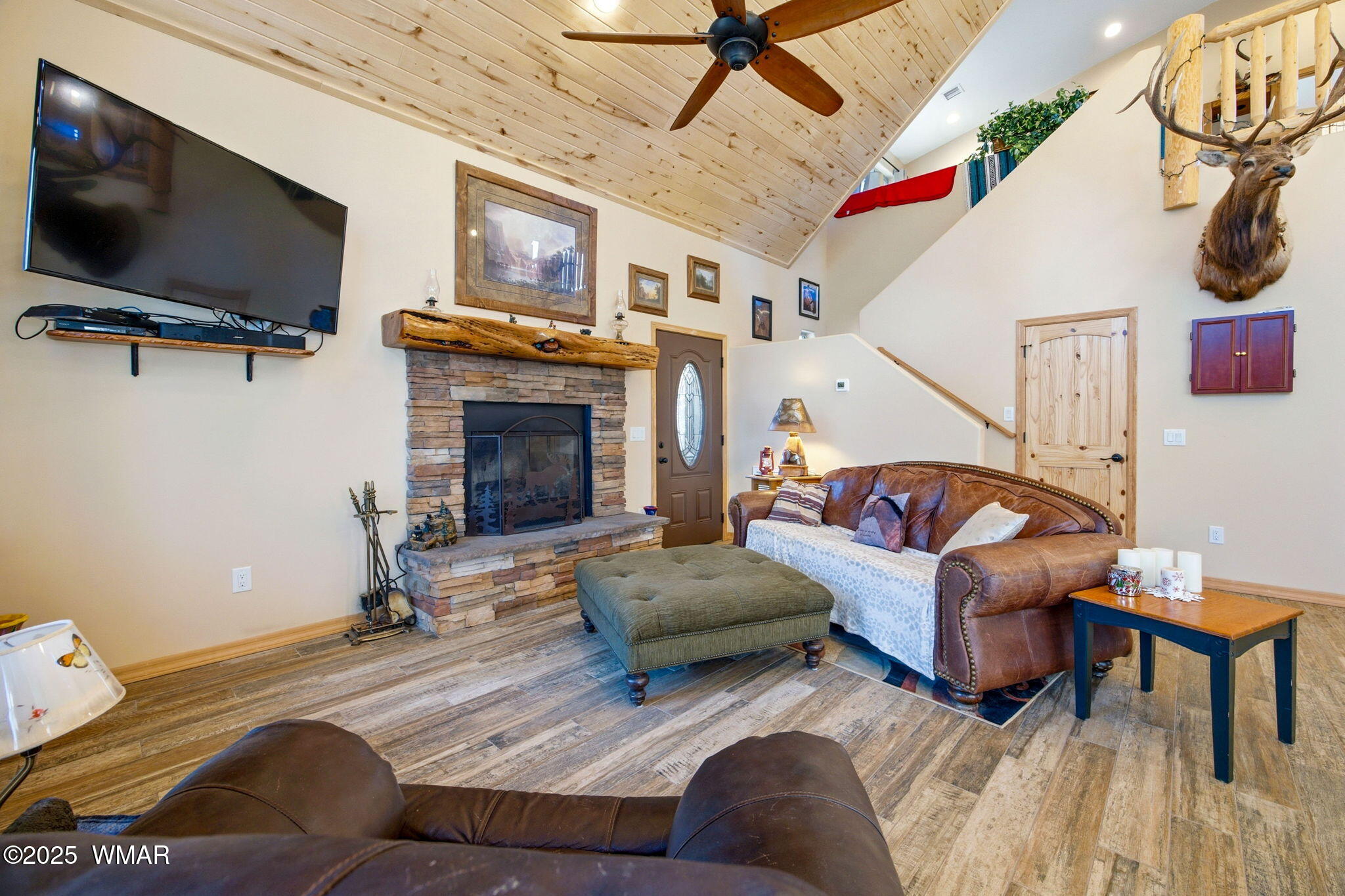 2009 Judy Ranch Road Overgaard, AZ 85933 - Photo 6 of 32 a living room with furniture and a flat screen tv