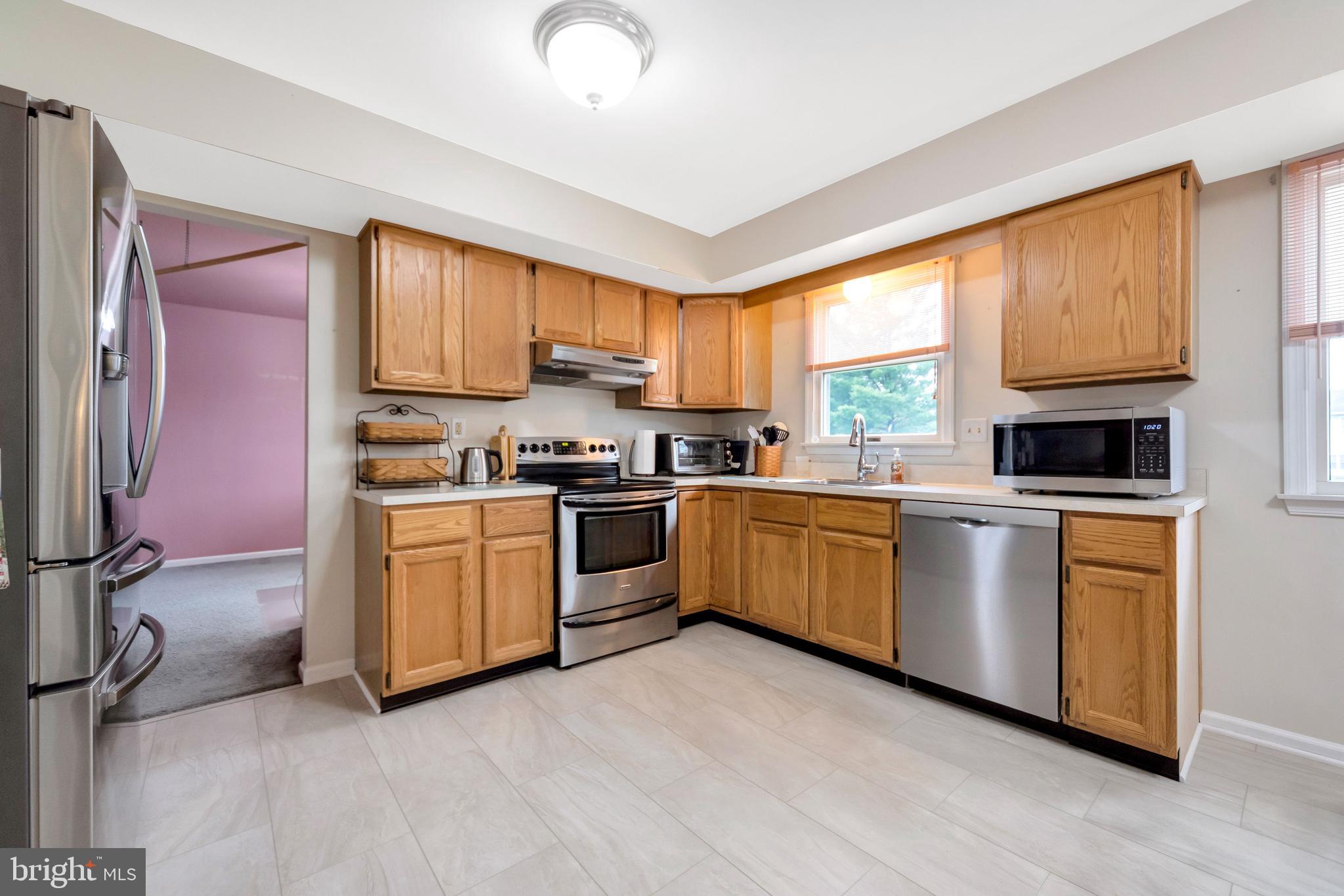 1072 Independence Way Hatfield, PA 19440 - Photo 12 of 37 a kitchen with a sink appliances cabinets and a window
