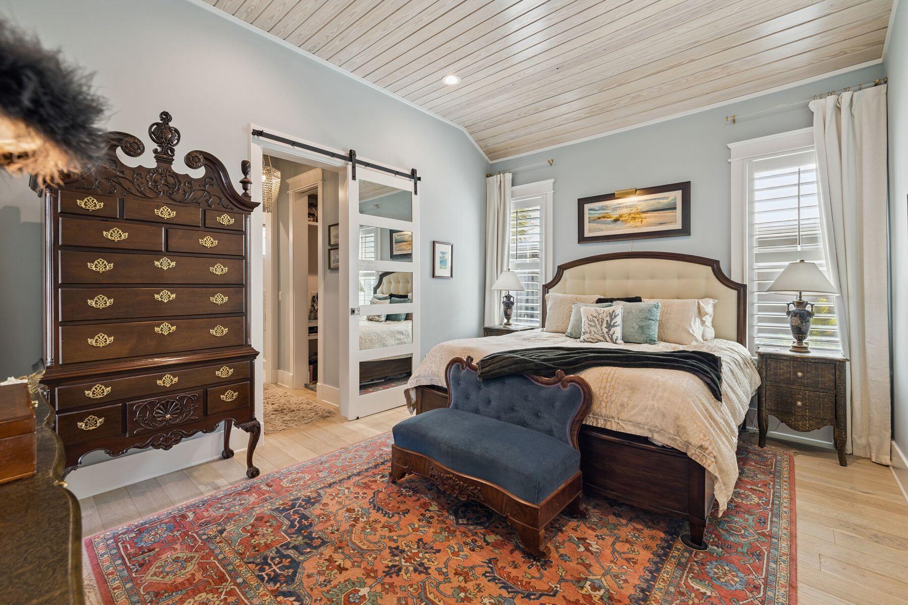 113 White Cliffs Drive Santa Rosa Beach, FL 32459 - Photo 15 of 38 a bedroom with a bed a table and chair