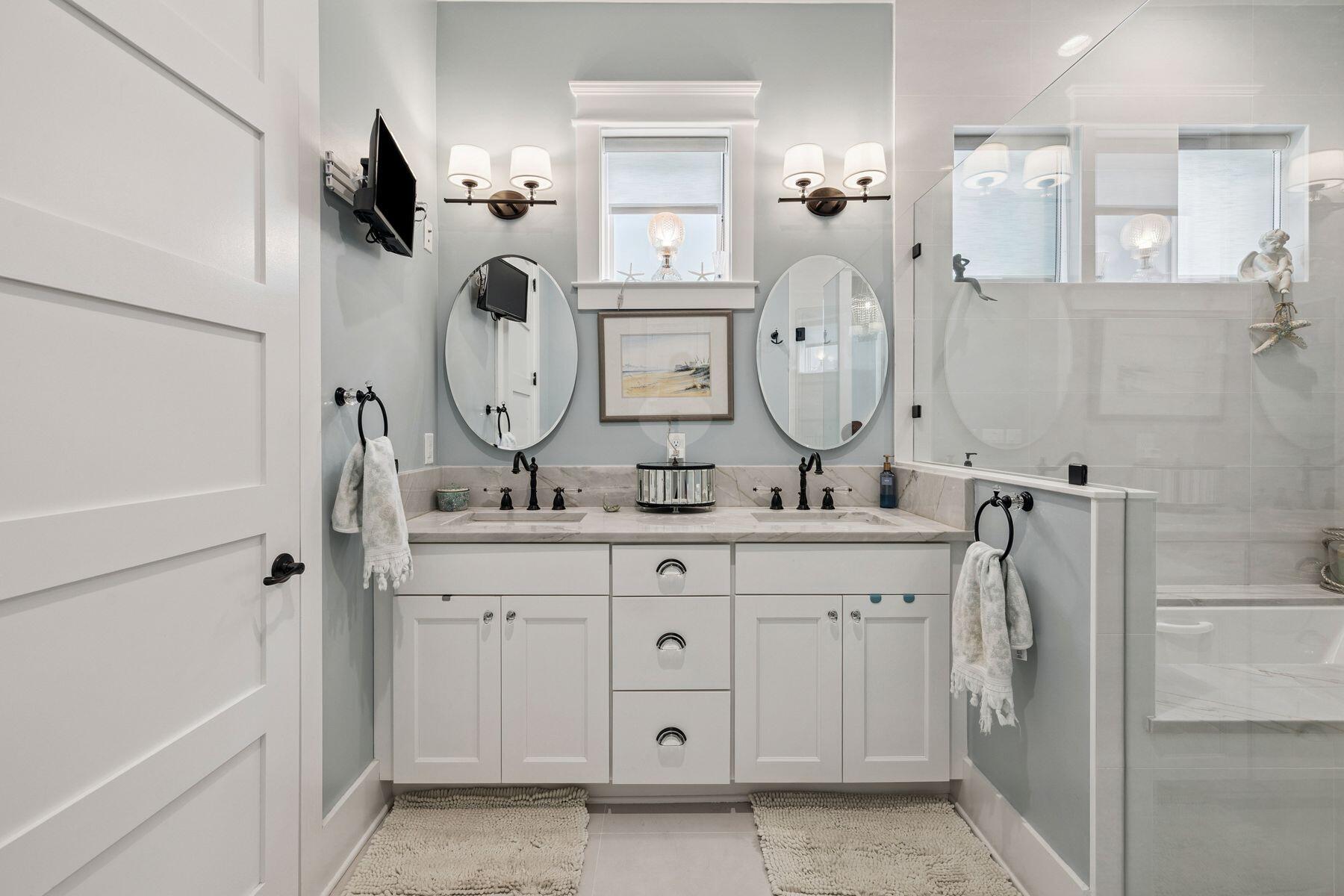 113 White Cliffs Drive Santa Rosa Beach, FL 32459 - Photo 17 of 38 a bathroom with a granite countertop sink a toilet and a mirror