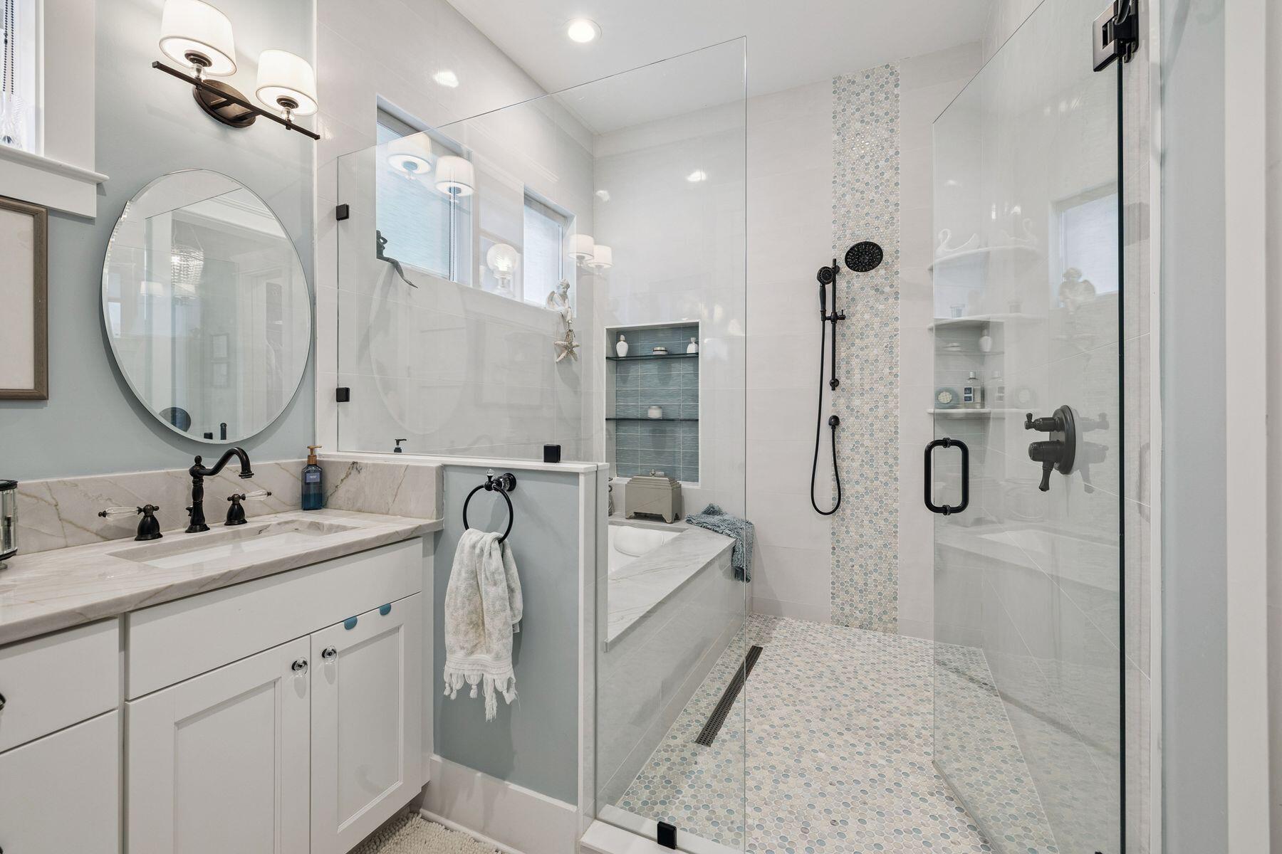 113 White Cliffs Drive Santa Rosa Beach, FL 32459 - Photo 18 of 38 a spacious bathroom with a double vanity sink a mirror a shower and a mirror