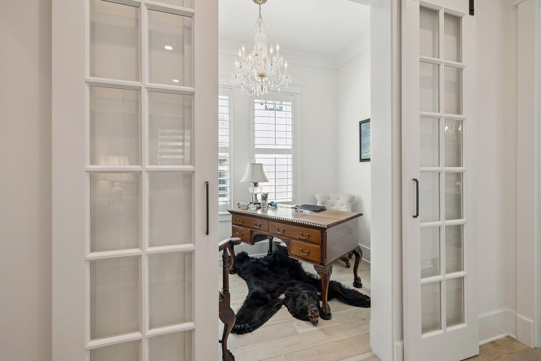 113 White Cliffs Drive Santa Rosa Beach, FL 32459 - Photo 19 of 38 a view of a bedroom with a table and chairs