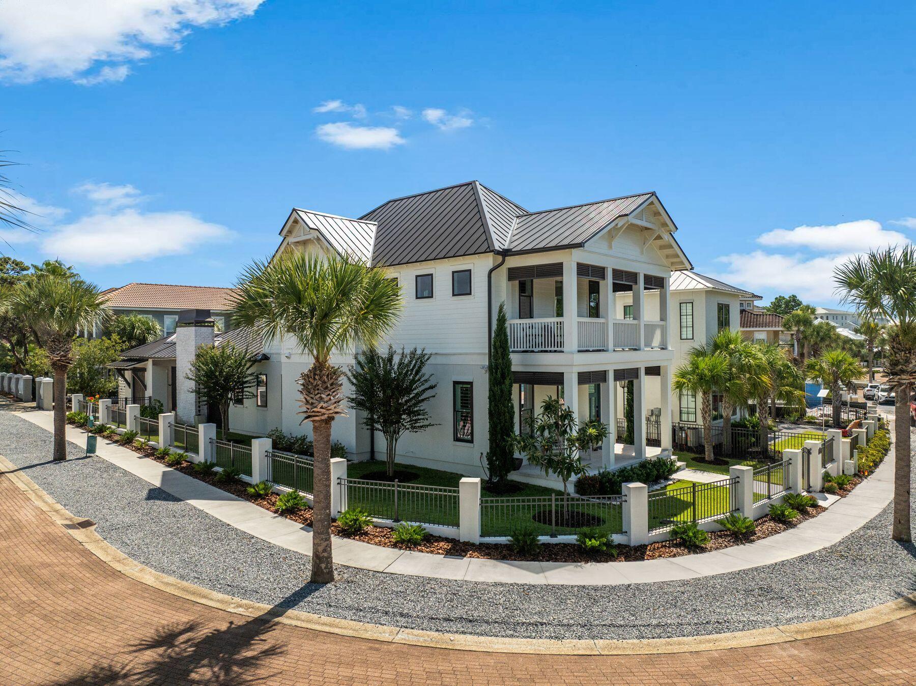 113 White Cliffs Drive Santa Rosa Beach, FL 32459 - Photo 2 of 38 a front view of a house with a yard