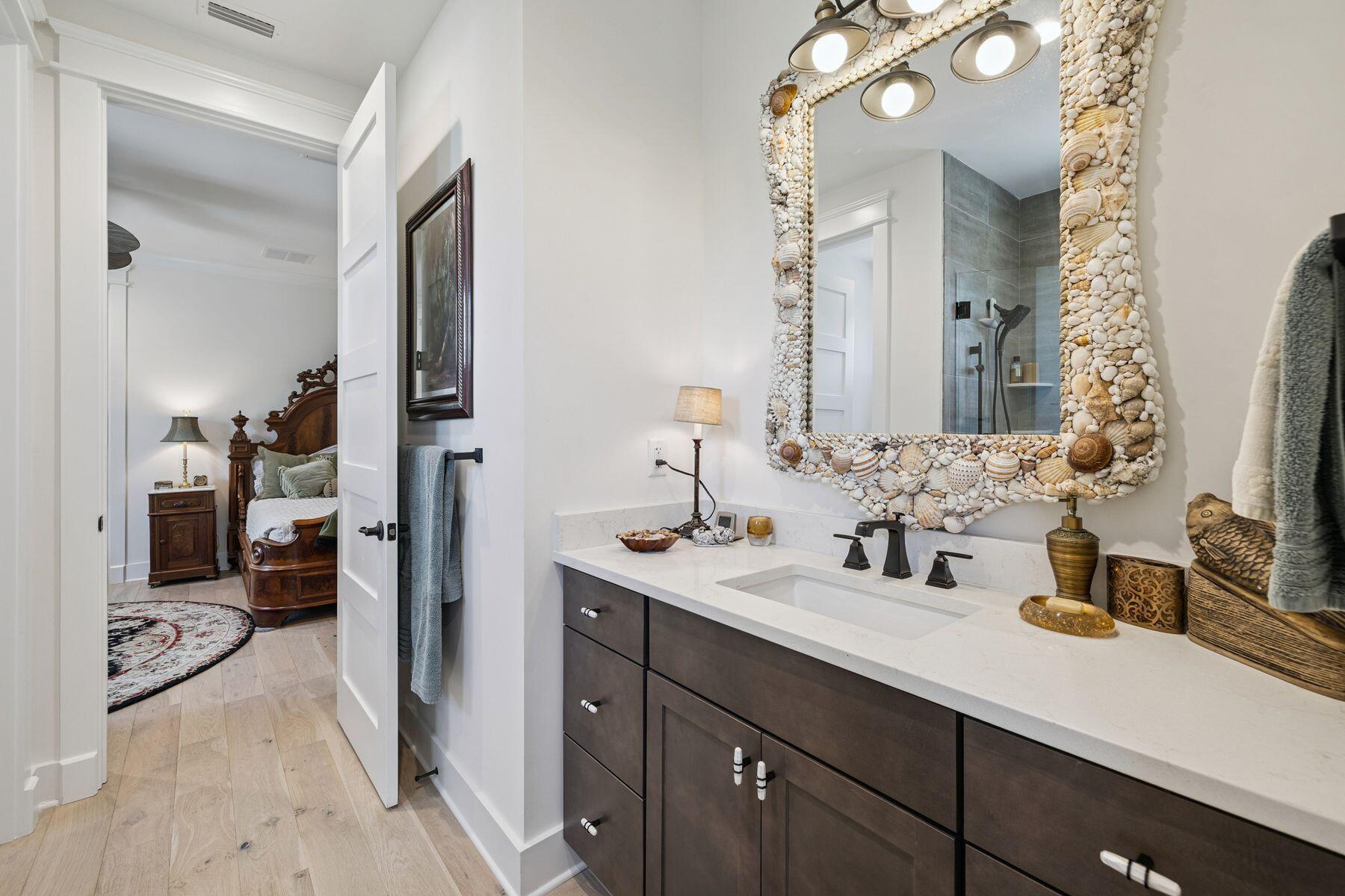 113 White Cliffs Drive Santa Rosa Beach, FL 32459 - Photo 26 of 38 a bathroom with a sink double vanity and a mirror