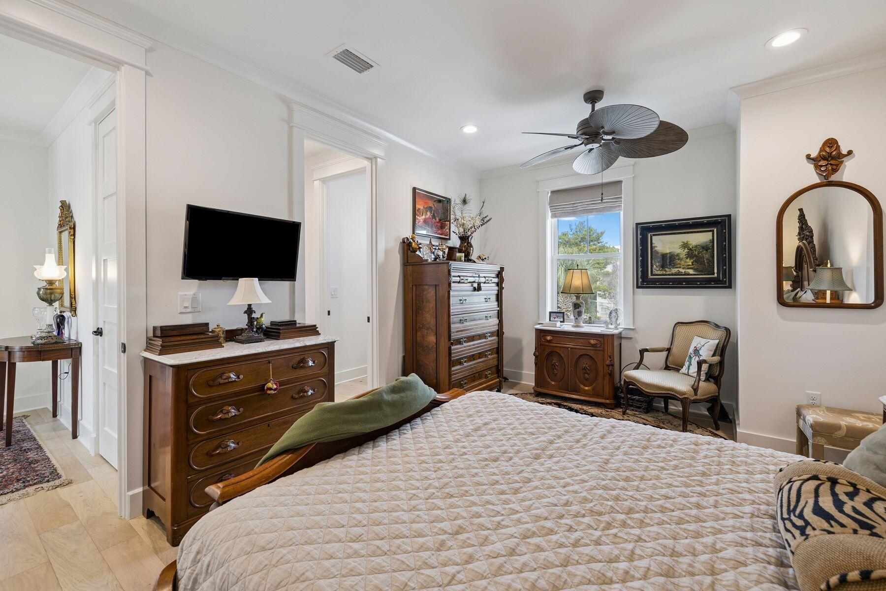 113 White Cliffs Drive Santa Rosa Beach, FL 32459 - Photo 29 of 38 a bedroom with a bed and a flat screen tv