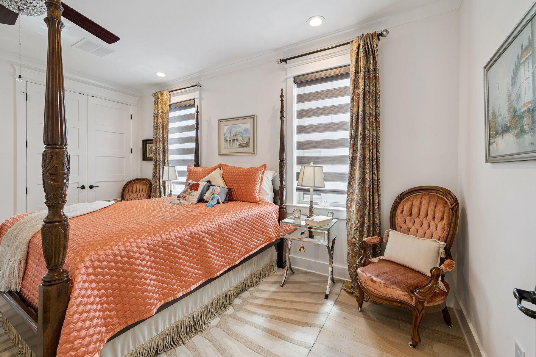 113 White Cliffs Drive Santa Rosa Beach, FL 32459 - Photo 30 of 38 a bedroom with a bed chair and a window