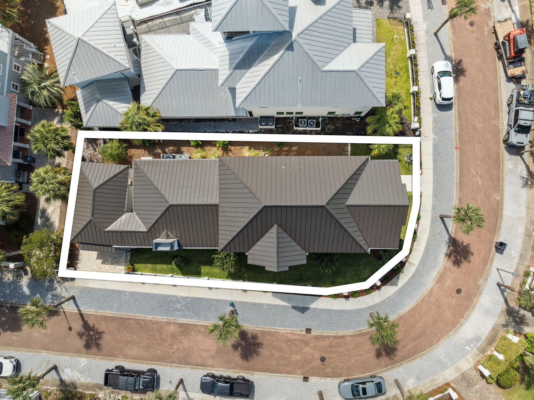 113 White Cliffs Drive Santa Rosa Beach, FL 32459 - Photo 33 of 38 an aerial view of a house with a yard and parking