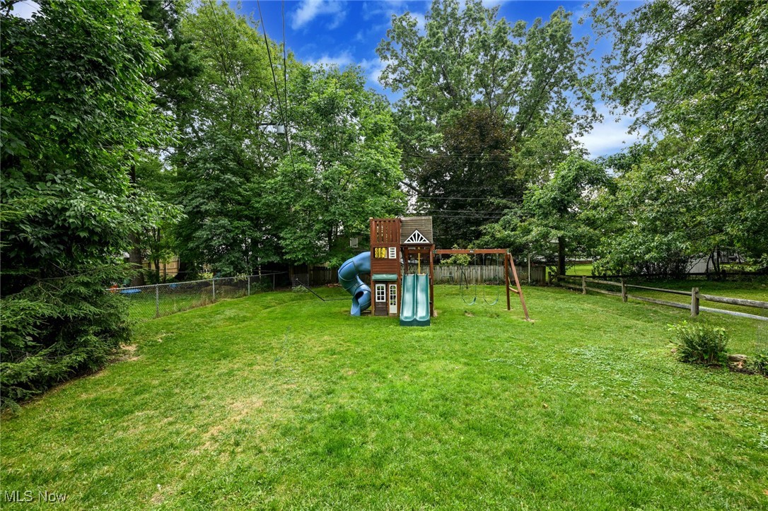 4940 Westbourne Road Cleveland, OH 44124 - Photo 25 of 26 View of yard featuring a playground