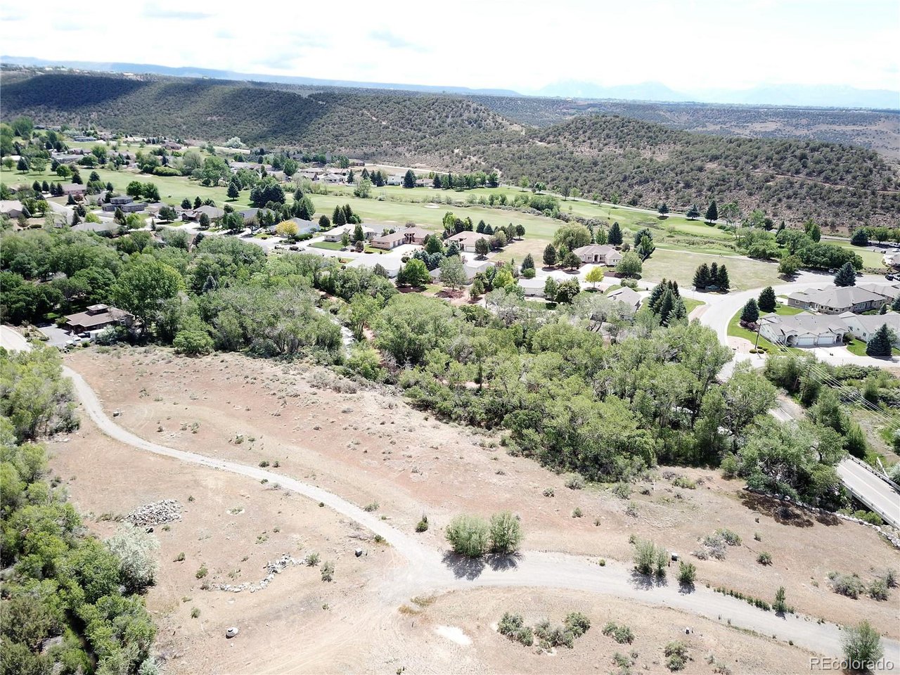1 Southeast Willow Way Cedaredge, CO 81413 - Photo 8 of 11 an aerial view of a house with a yard