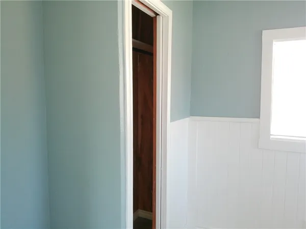 a view of a window in an empty room