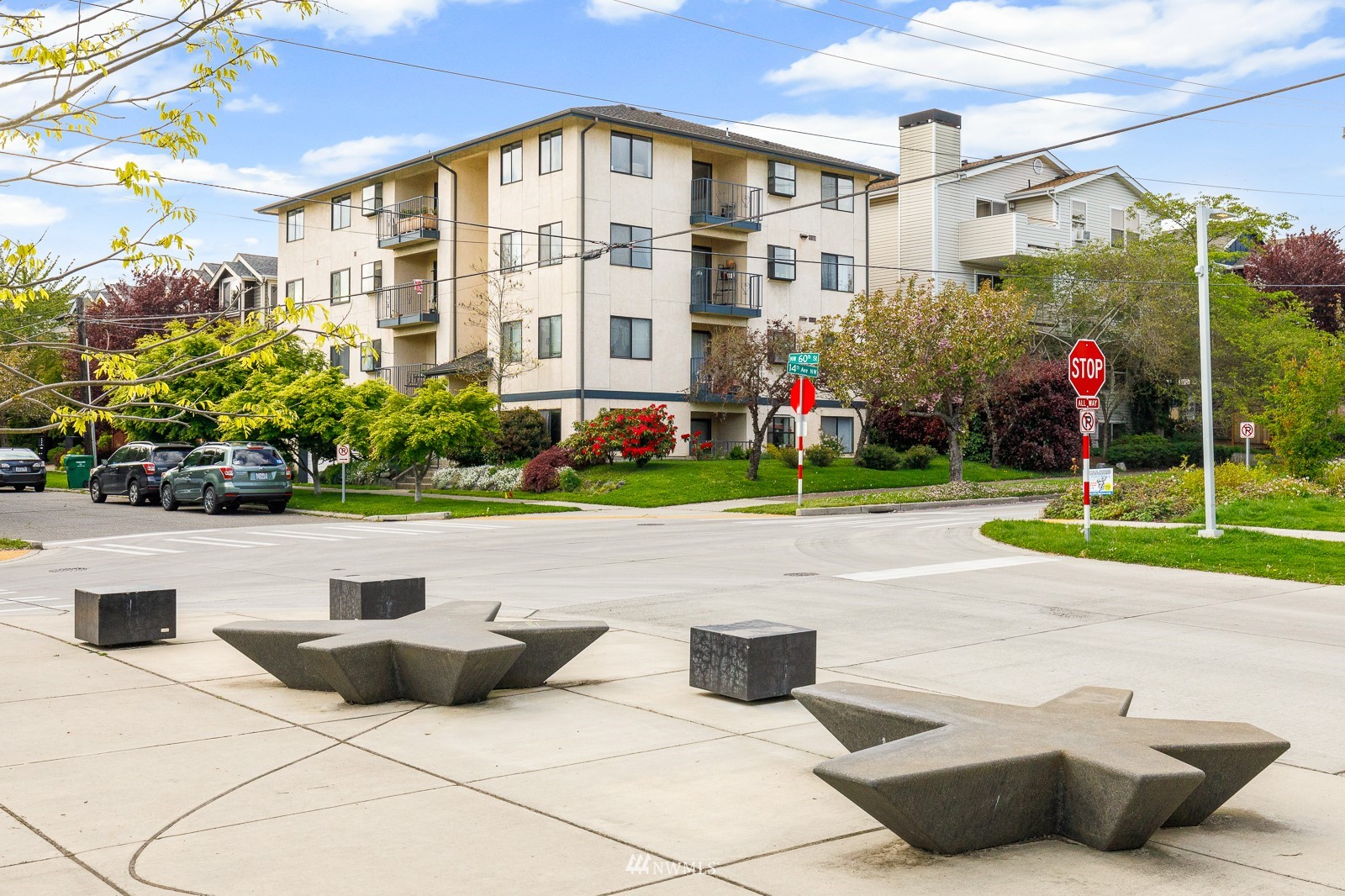 1400 Northwest 60th Street, Unit 202 Seattle, WA 98107 - Photo 21 of 23 a front view of building with yard