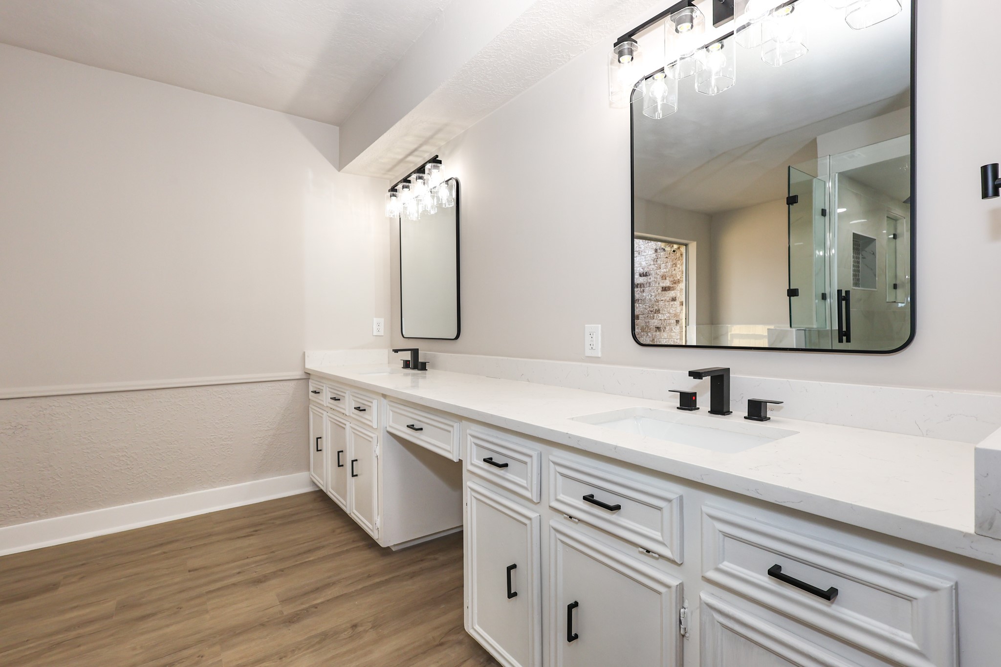 20719 Burnt Amber Lane Houston, TX 77073 - Photo 16 of 32 a bathroom with a double vanity sink and a mirror