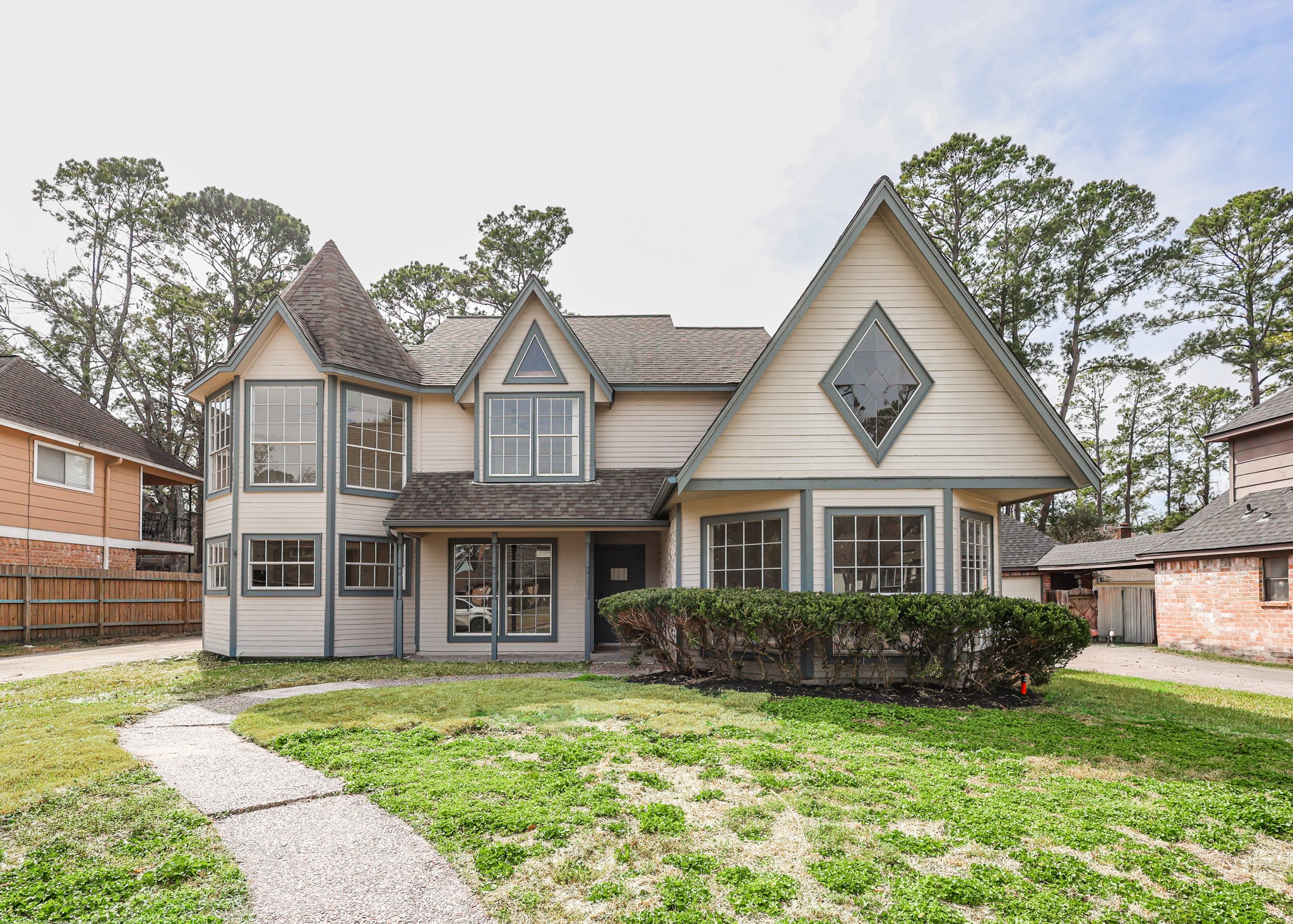 20719 Burnt Amber Lane Houston, TX 77073 - Photo 2 of 32 a front view of a house with a yard
