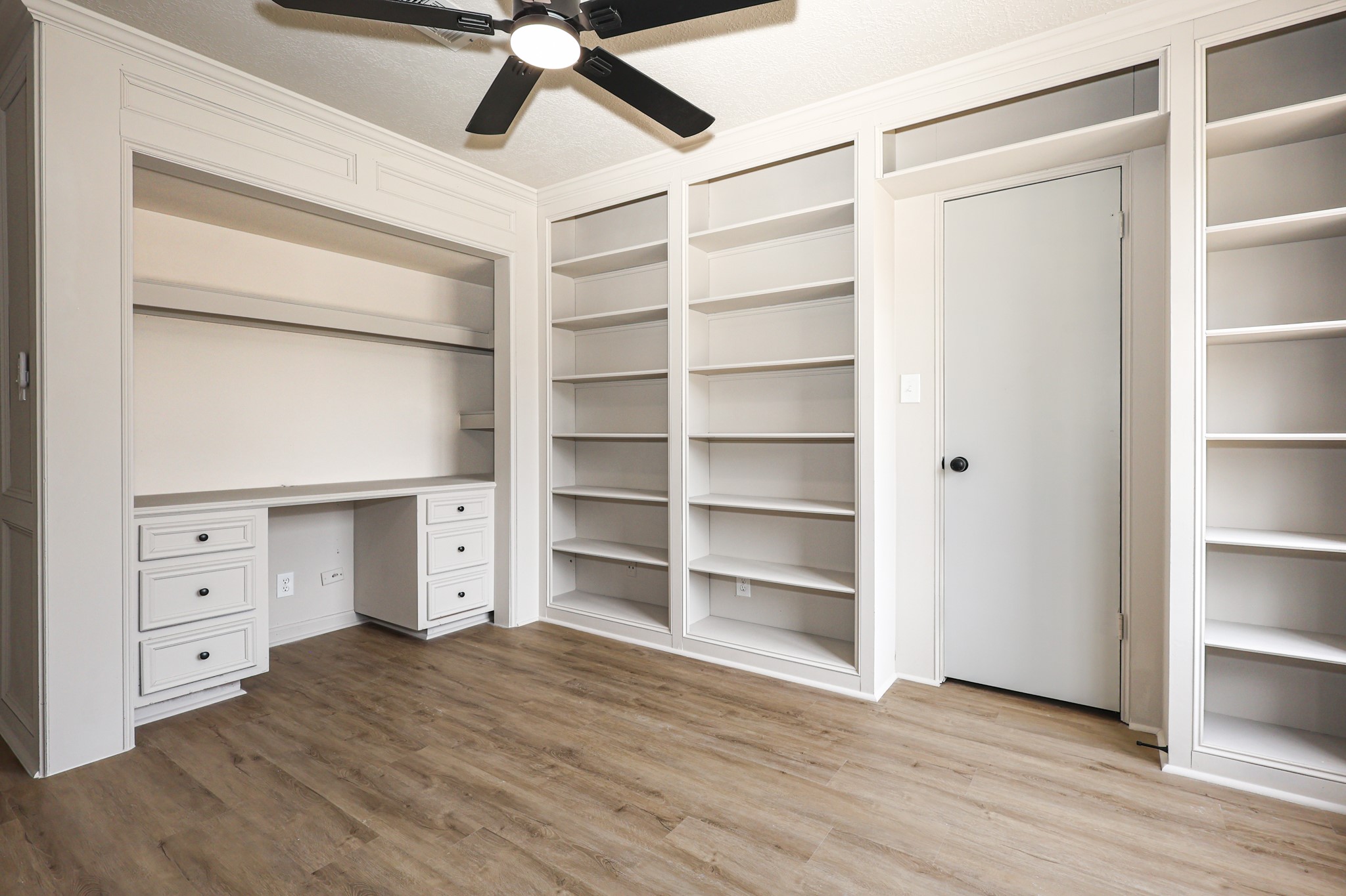20719 Burnt Amber Lane Houston, TX 77073 - Photo 24 of 32 a view of an empty room with cabinet and a window