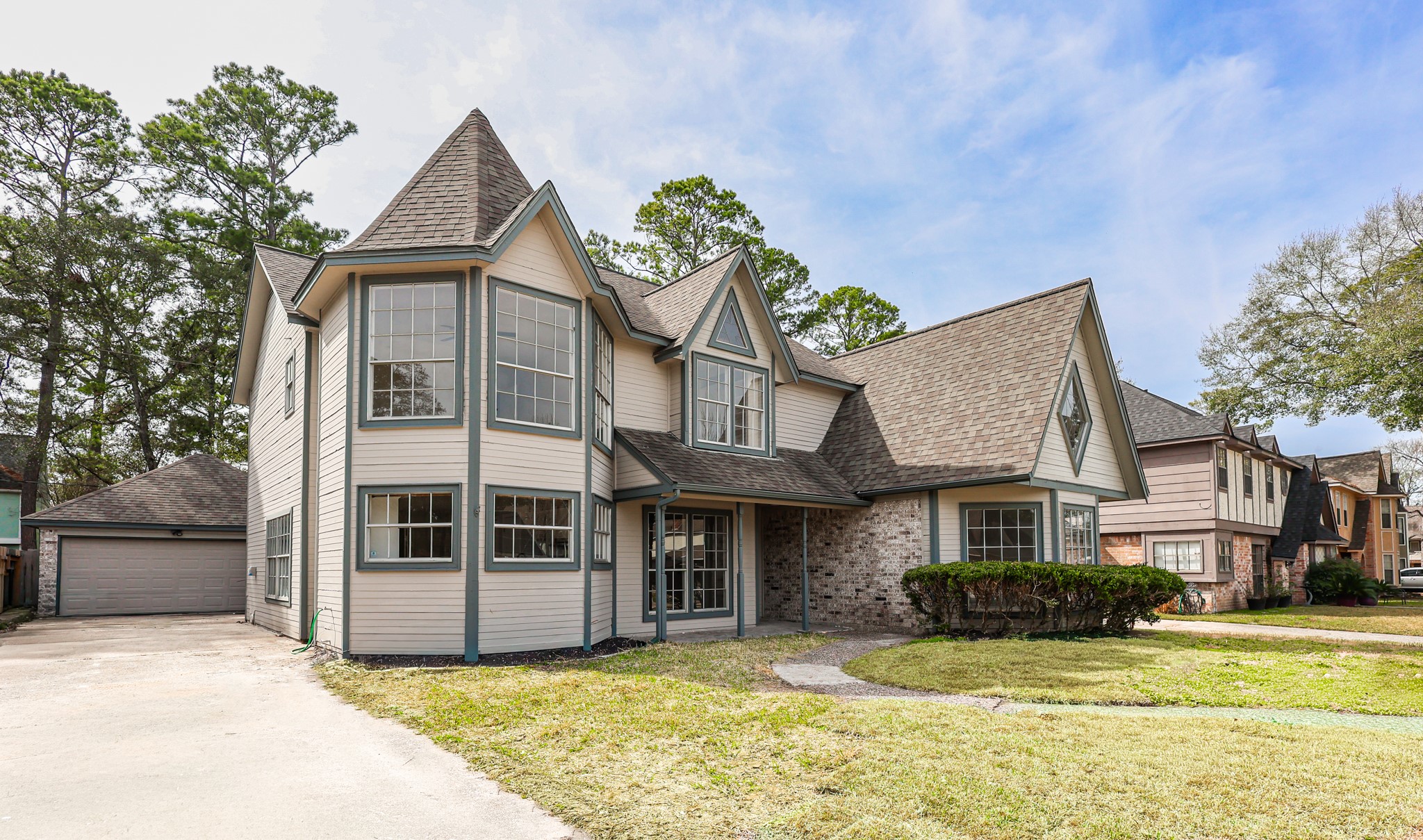 20719 Burnt Amber Lane Houston, TX 77073 - Photo 3 of 32 a front view of a house with a yard