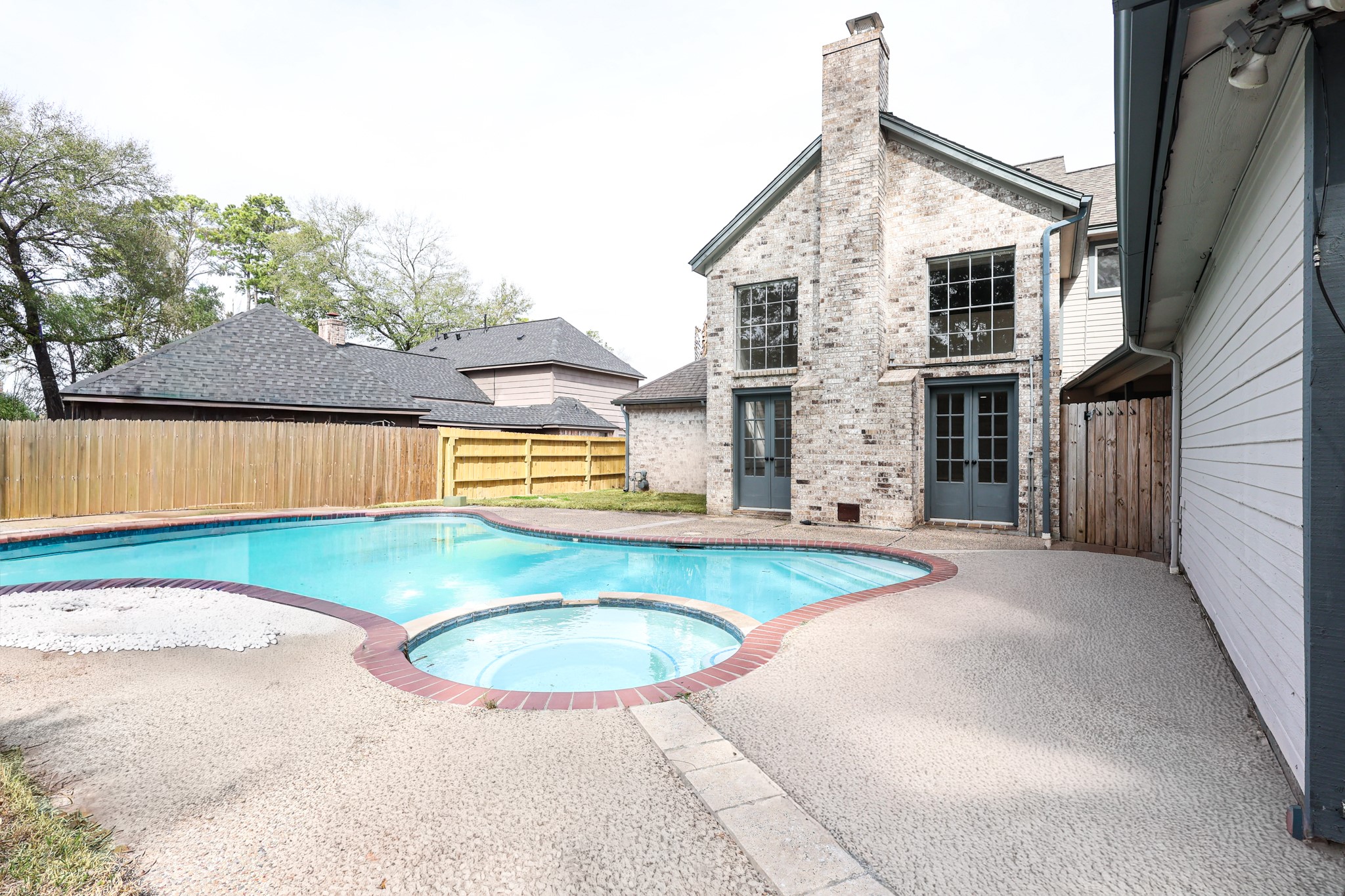 20719 Burnt Amber Lane Houston, TX 77073 - Photo 31 of 32 a view of a house with swimming pool
