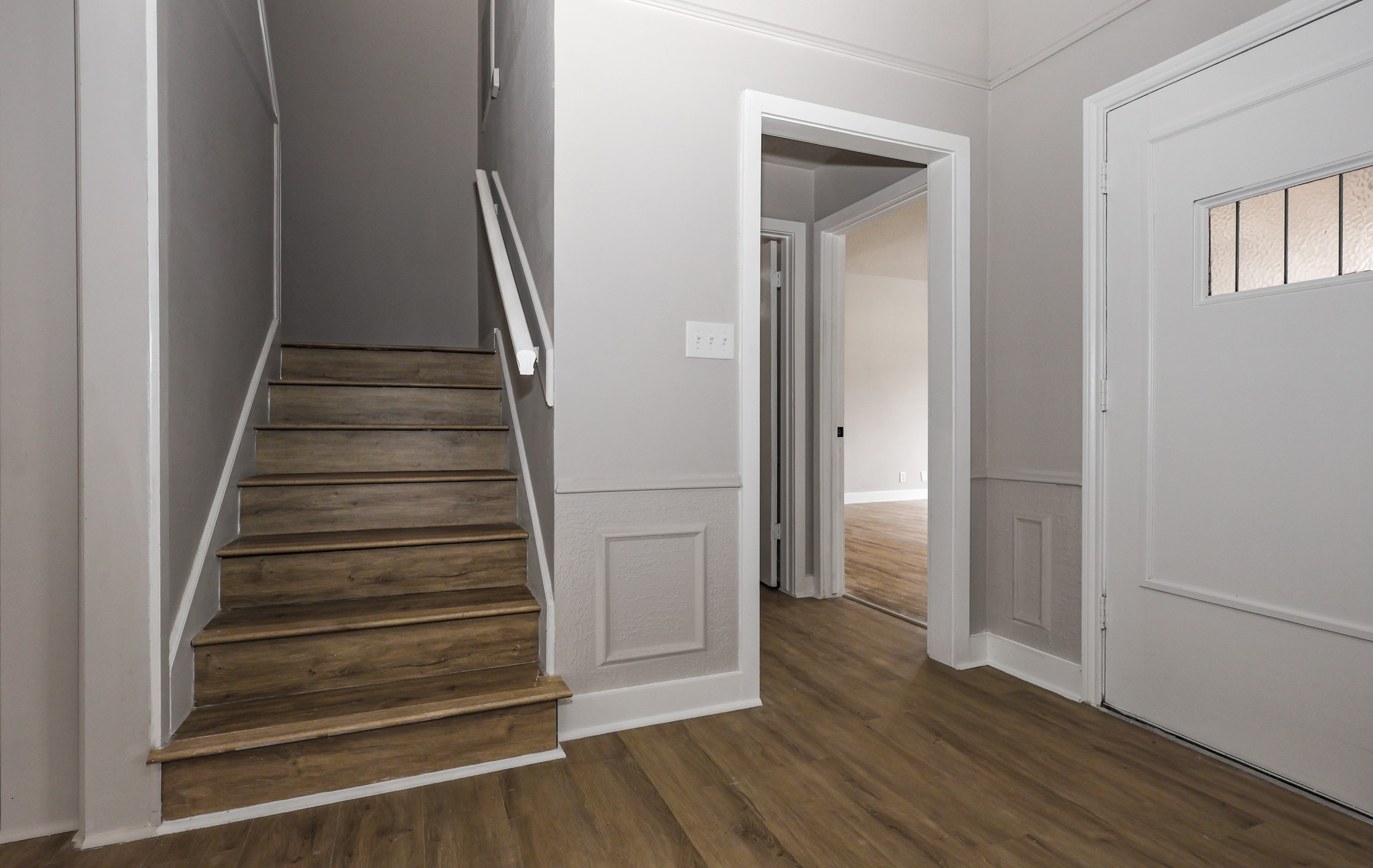 20719 Burnt Amber Lane Houston, TX 77073 - Photo 6 of 32 a view of an entryway with wooden floor