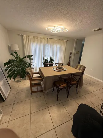 a view of a livingroom with furniture and window
