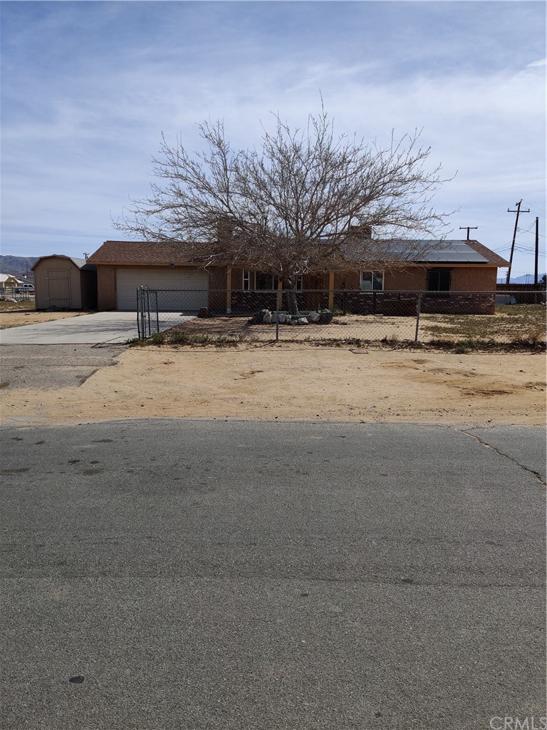 12005 Morning Star Road Apple Valley, CA 92308 - Photo 1 of 1 a car parked on the side of the road