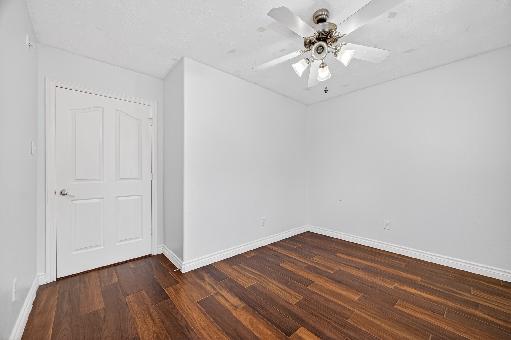 23914 Glengate Drive Spring, TX 77373 - Photo 31 of 49 a view of an empty room with window and a chandelier fan
