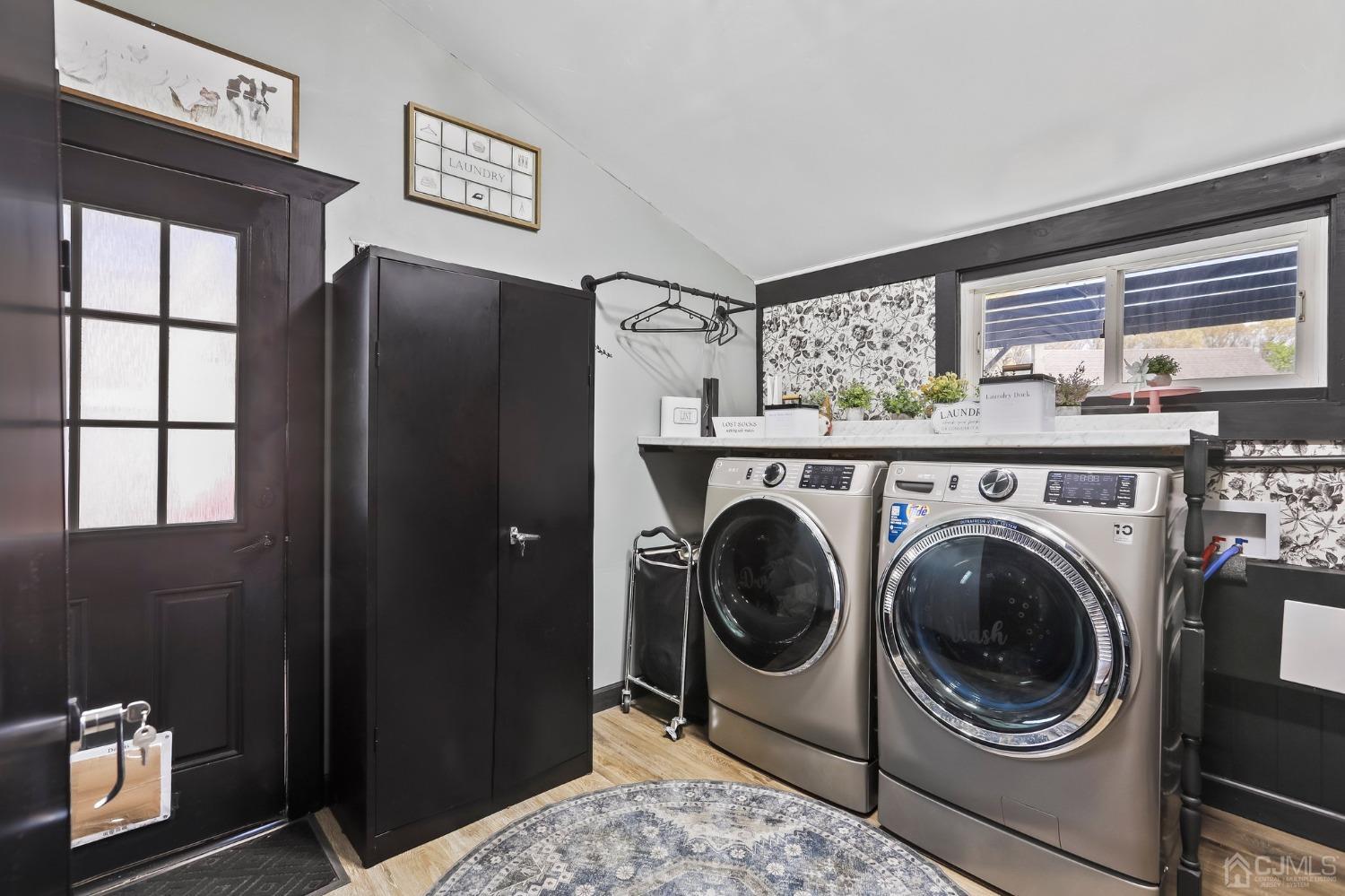 26 Sunrise Road Old Bridge, NJ 08857 - Photo 13 of 33 a utility room with a window dryer and washer