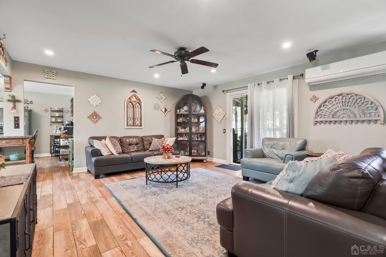 26 Sunrise Road Old Bridge, NJ 08857 - Photo 15 of 33 a living room with furniture and a large window